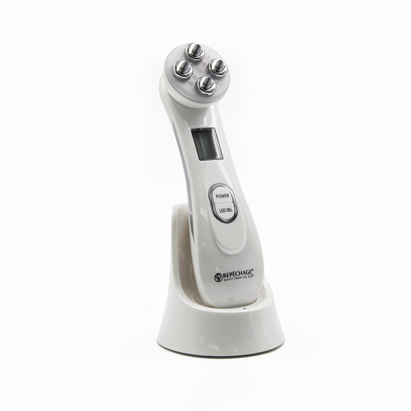  LED Radio Frequency and EMS Skin Tightening Machine in charging stand next to Galvanic Gel bottle