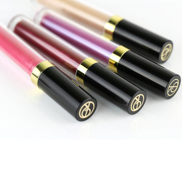 All four Perfect Skin Conditioning Lip Gloss colors lined up in a row