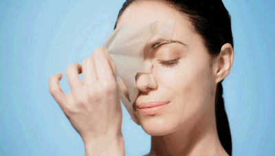 Female model removing Vita Cura® B3 Lifting sheet mask from face