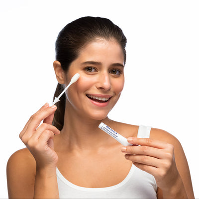 Model demonstrating the use of Rapidex on cheek area