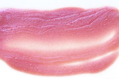 close up smear of rock star Perfect Skin Conditioning Lip Gloss
