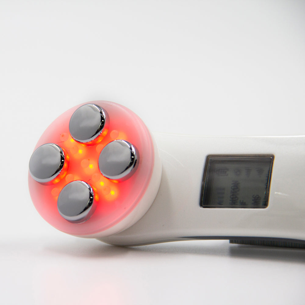 Repêchage® LED Radio Frequency and EMS Skin Tightening Machine turned on lit up to red